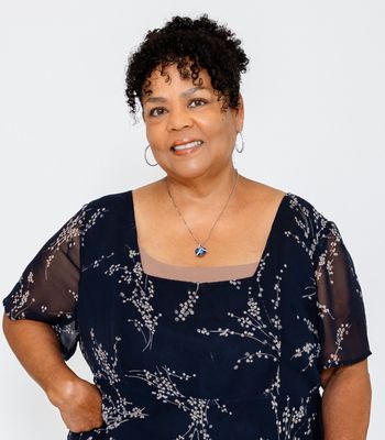 Portrait of Kim Alpough, REALTOR®.